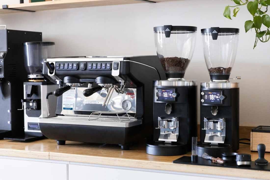 Nuova Simonelli Appia Life Compact 2 Group Volumetric with Autosteam 220V Espresso Machine in a cafe setting